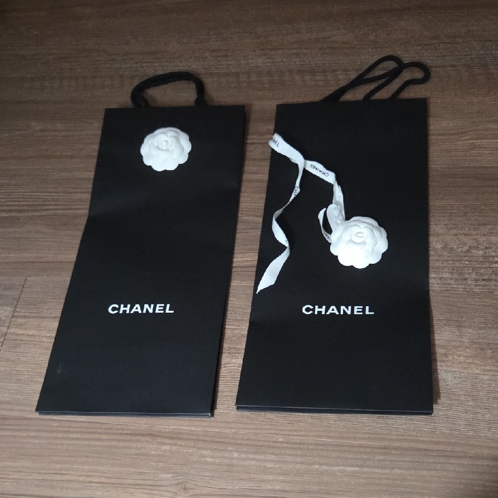 Chanel Black Bags with White Floral Detail